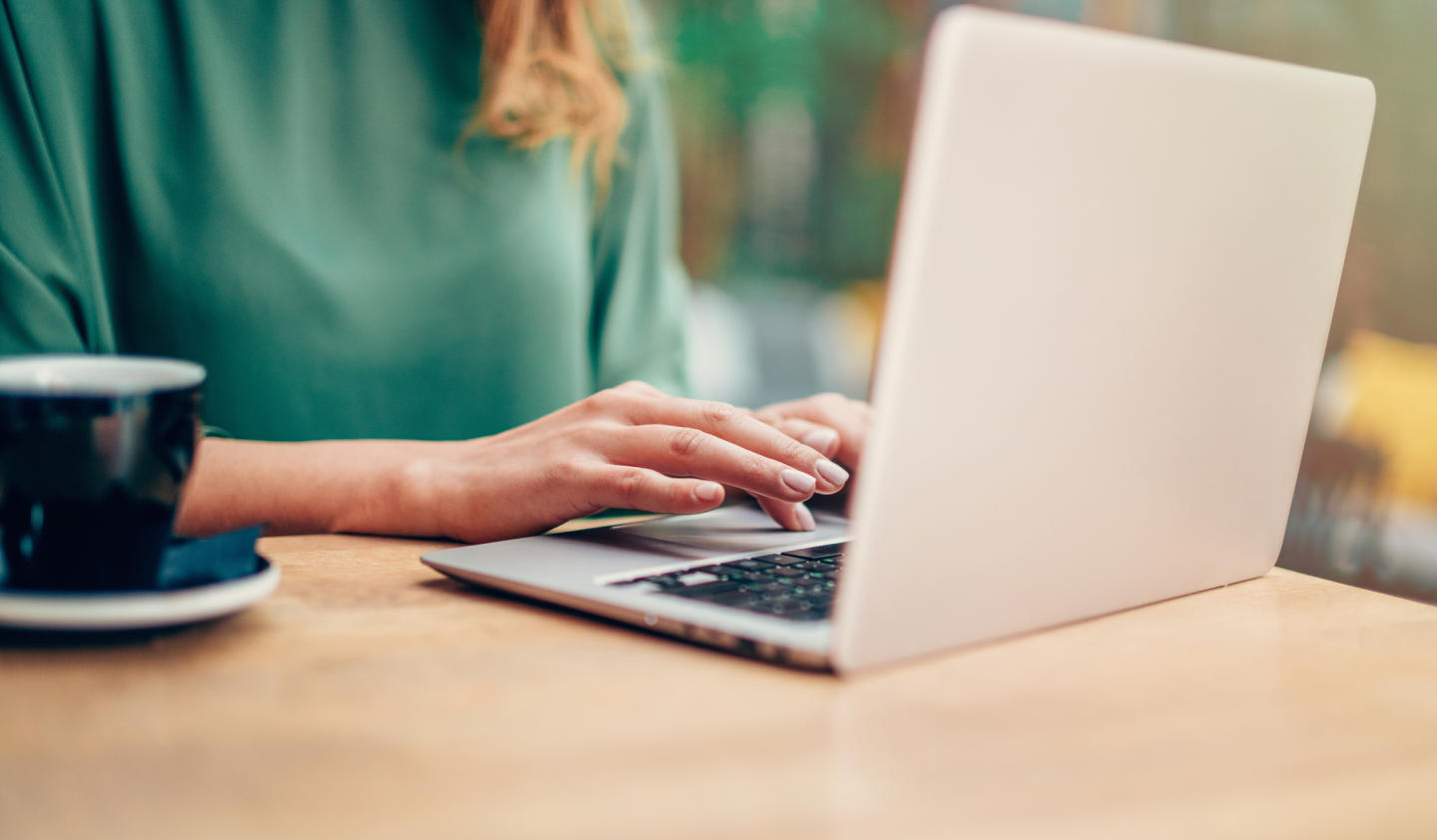 Person typing on laptop