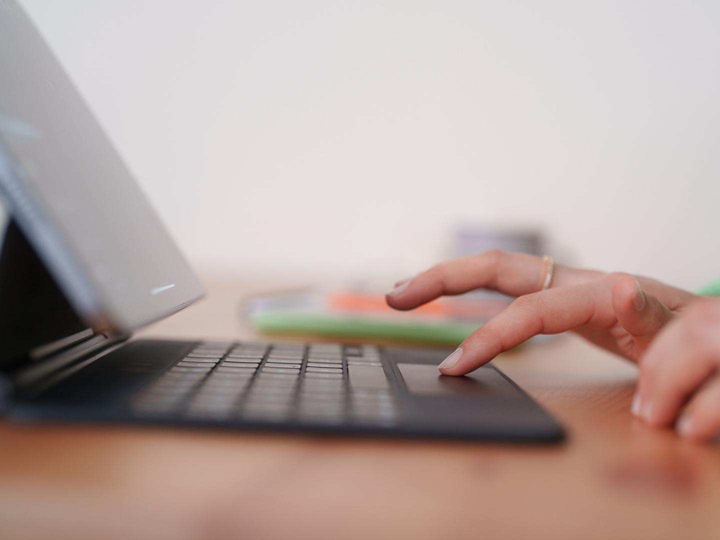 Person typing on laptop 