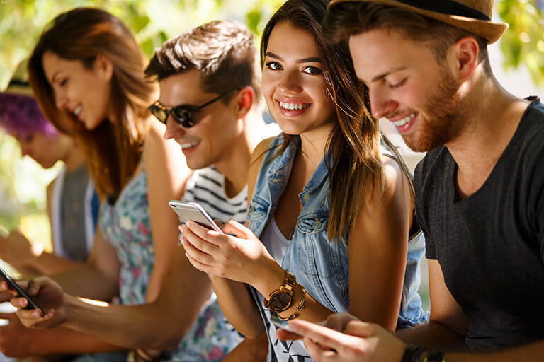 friends on smartphones