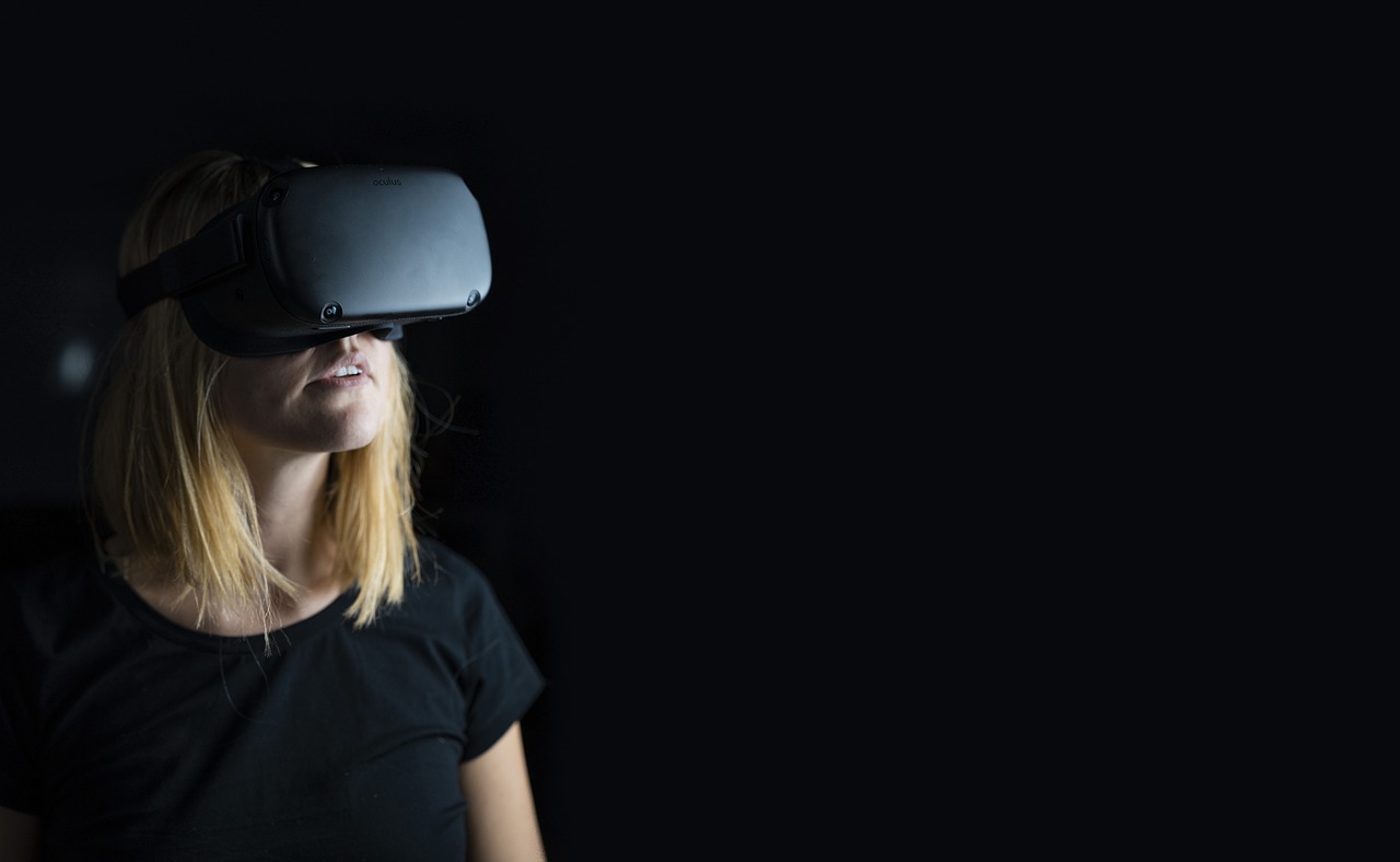 a woman in virtual reality glasses.