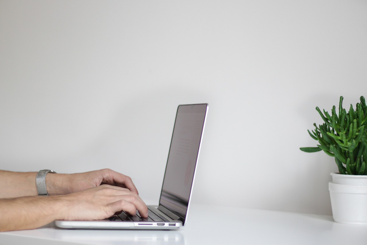 a man working on a laptop.