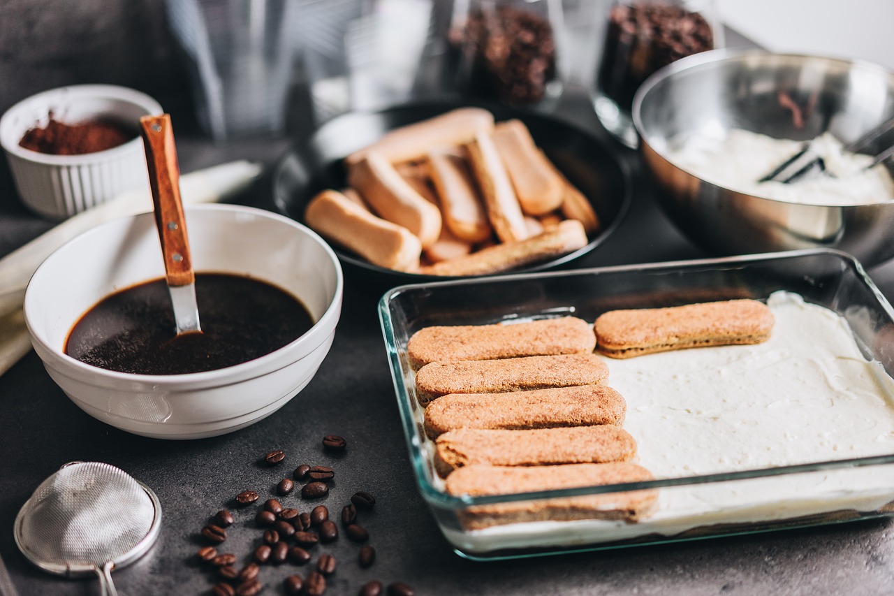 a selection of food on a wooden table.