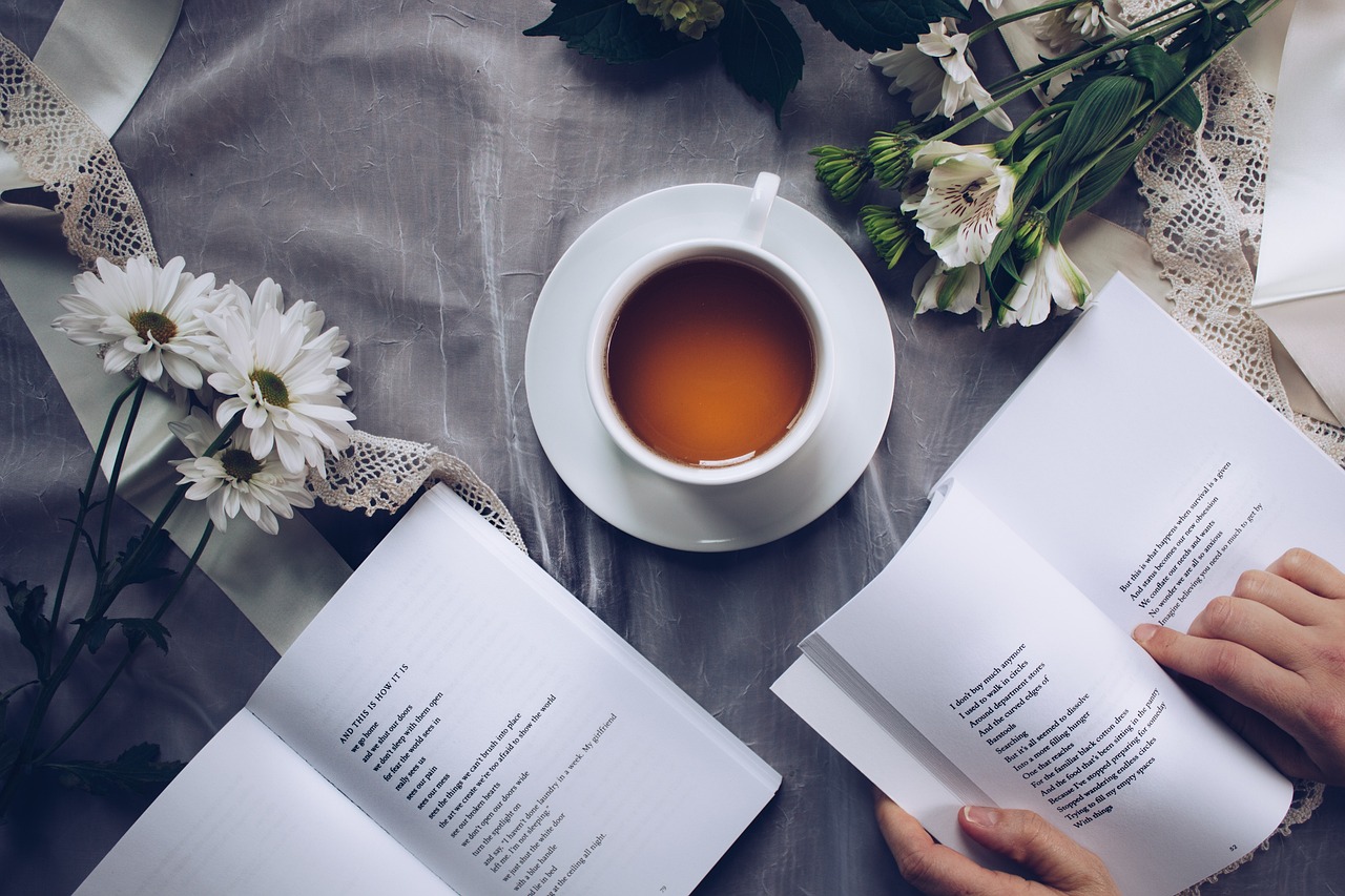 reading a book with cup of coffee.