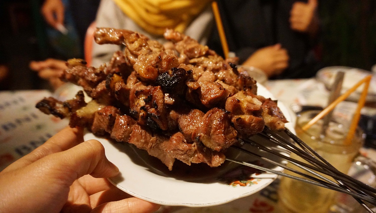 a plate of meat and vegetables.