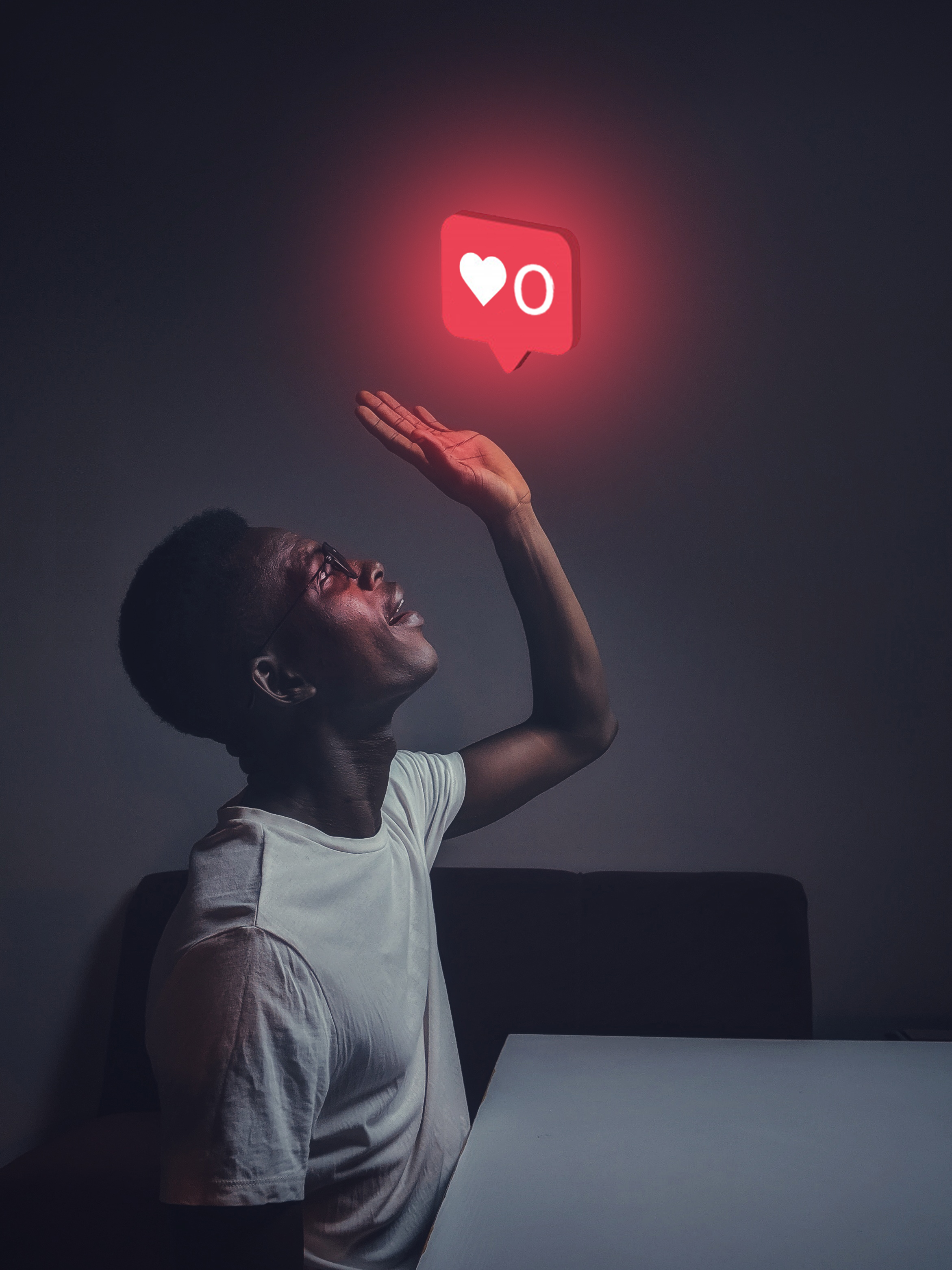 man holding a light bulb in his hand.