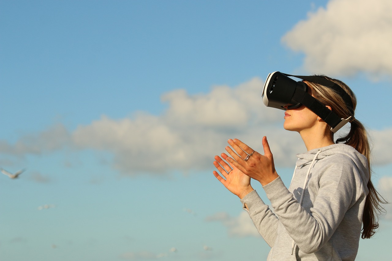 woman with virtual reality glasses in the sky.