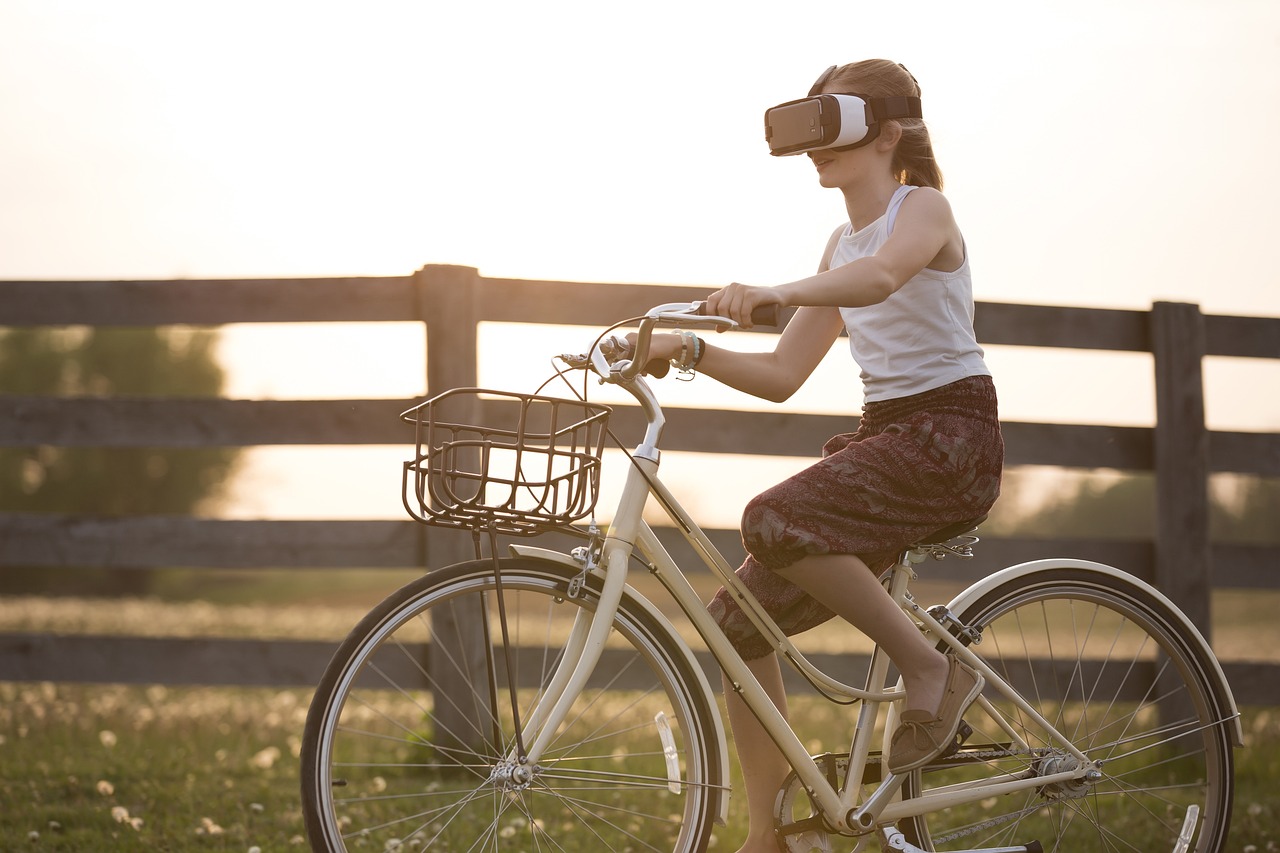 young woman in virtual reality glasses on the nature.