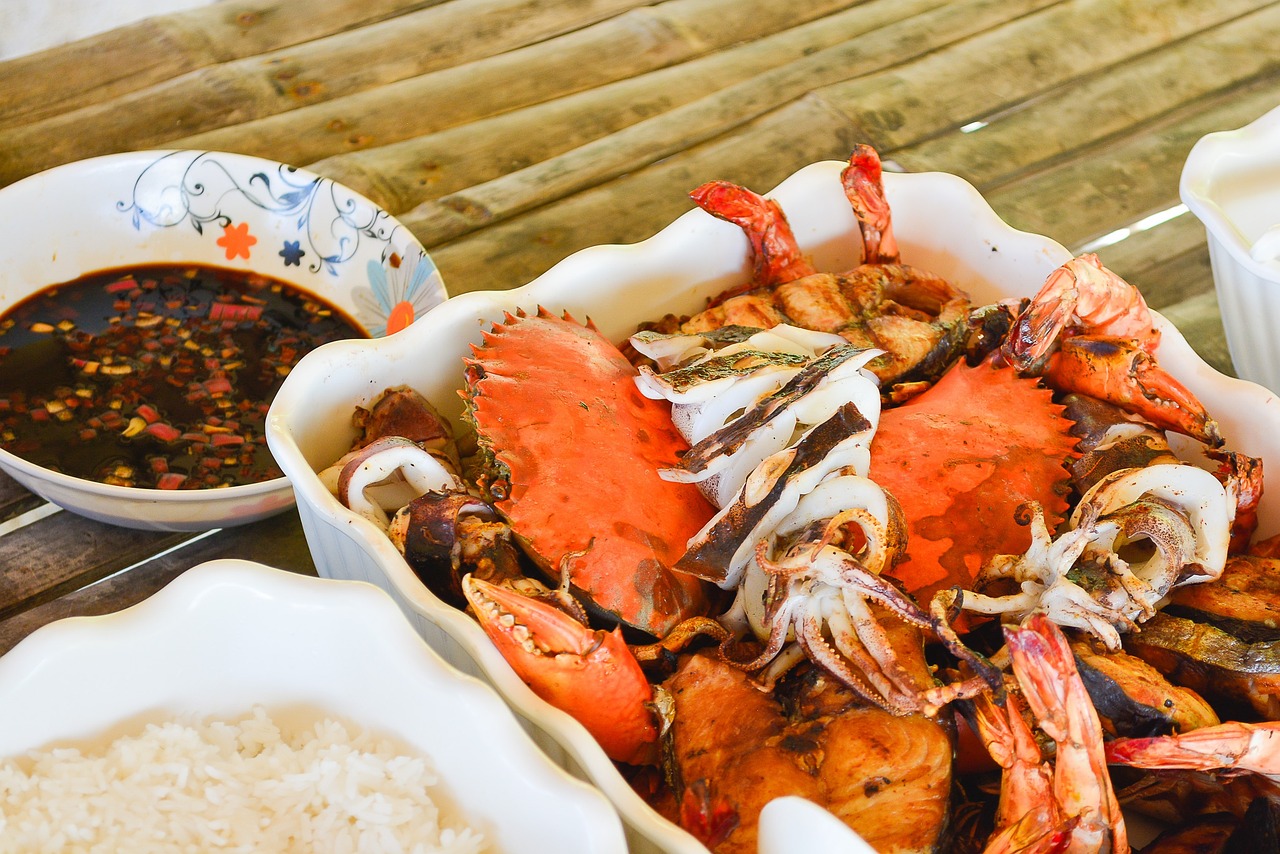 a plate of cooked shrimps.