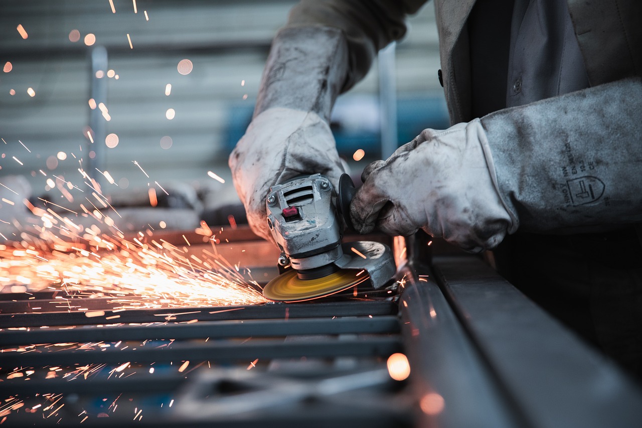 a welder working on a piece of metal.