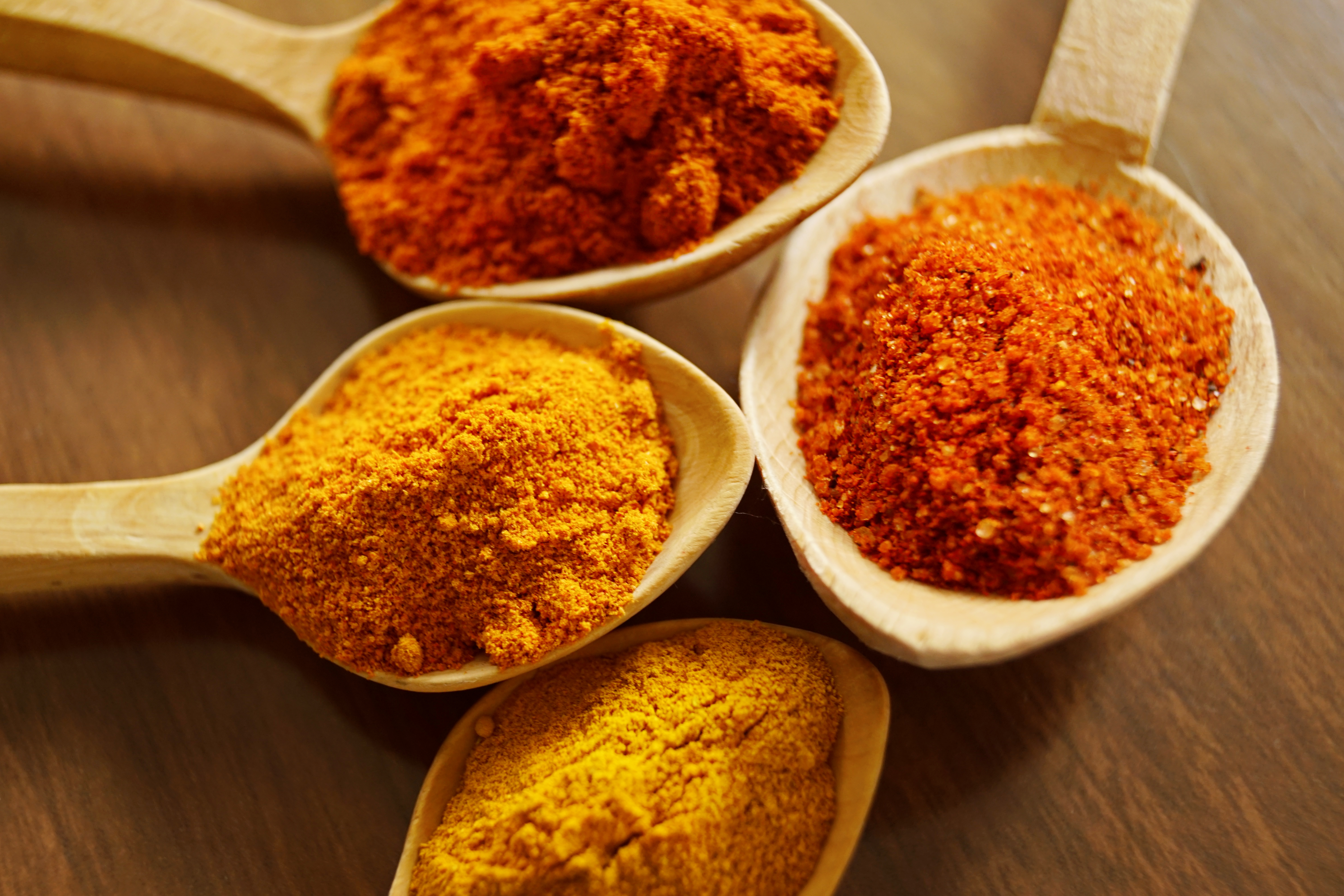 spices in a wooden bowl.