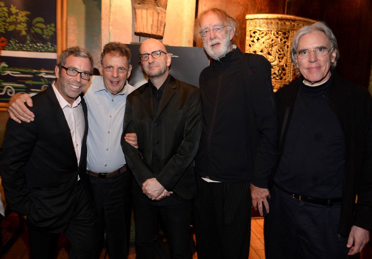From Left to Right: Jon Kane (Associate Director/Producer/Editor), Philip Glass (Composer), Steven Soderbergh (Presenter), Godfrey Reggio (Director) and Michael Riesman (Conductor of World Premiere at TIFF) | Photo Credit: Michael Buckner / Getty Images