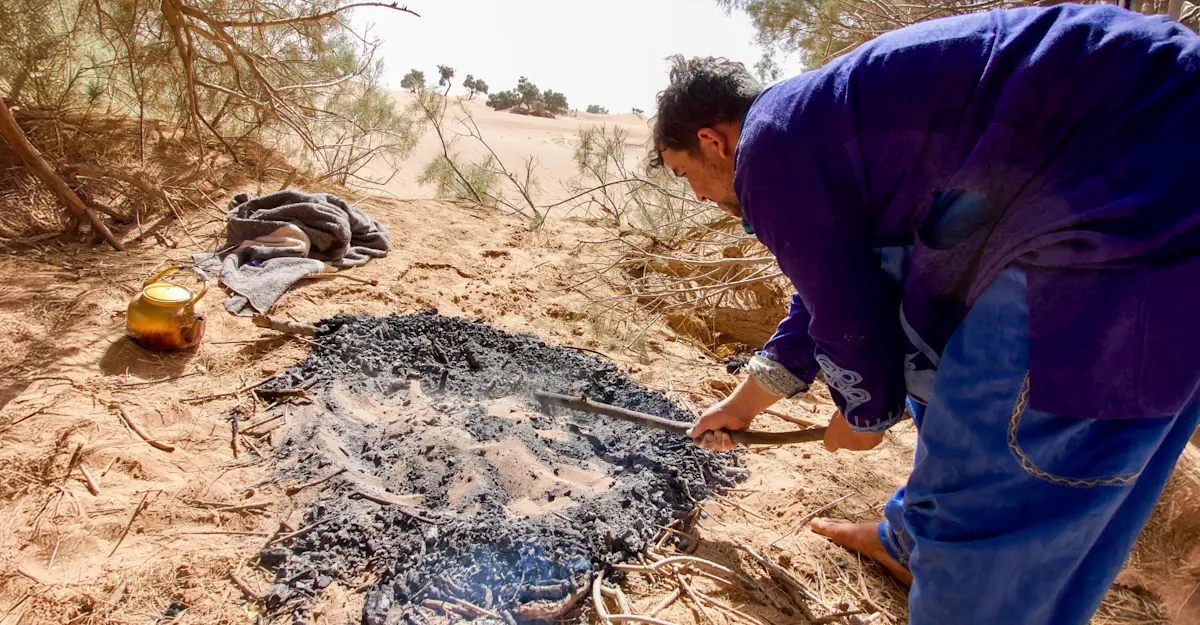 Sand bread preparation, Morocco.