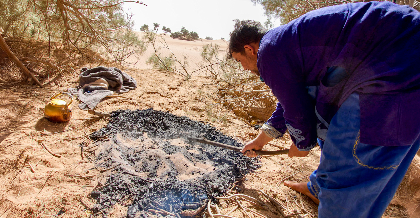 Sand bread preparation, Morocco.