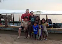 Time out to play with new friends while kayaking the Mekong River through Cambodia.