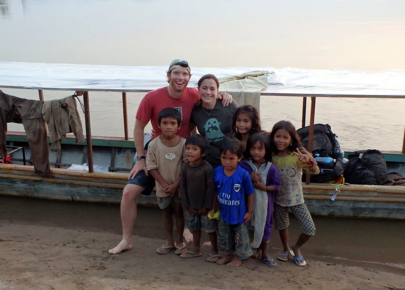 Time out to play with new friends while kayaking the Mekong River through Cambodia.