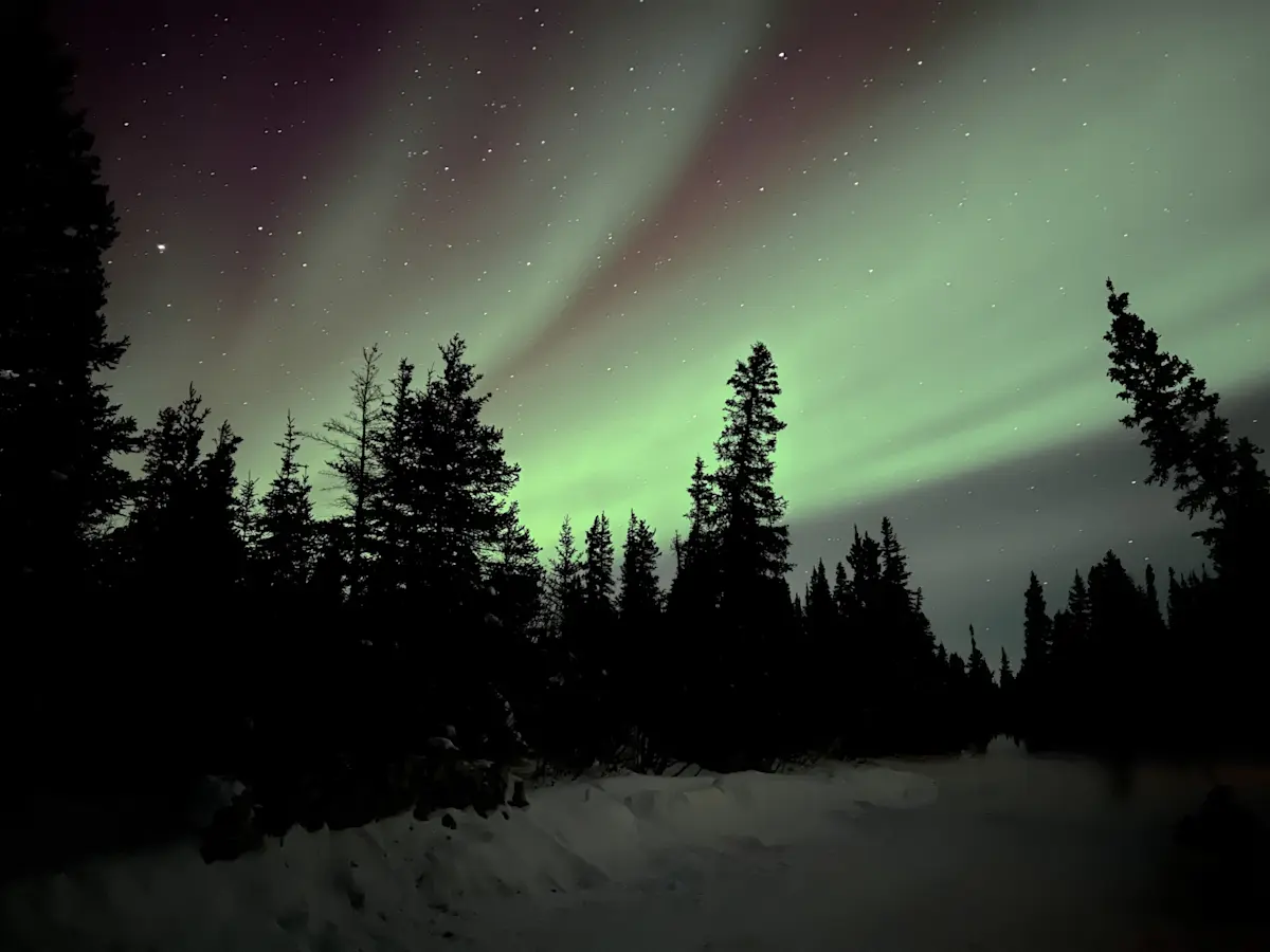 The real magic was wine in hand, watching the Northern Lights, Canada.