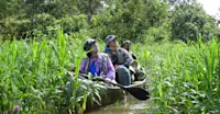 Earthwatch Expeditions guests canoeing, Amazon, Peru.