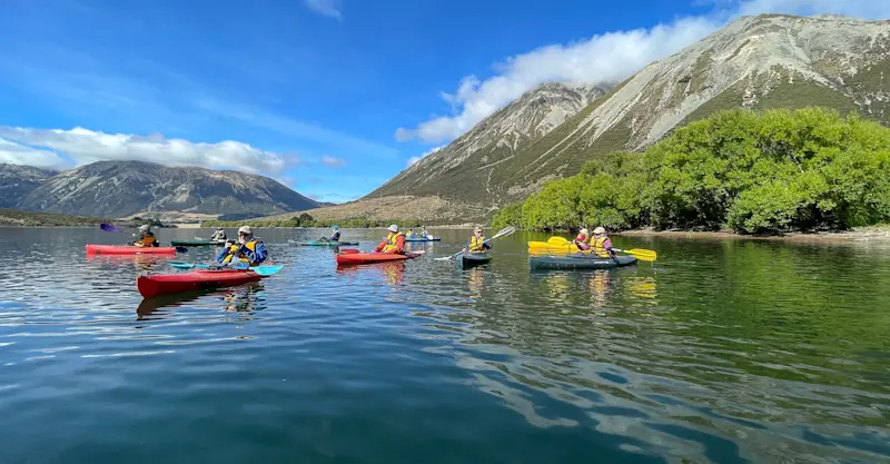 Nat Hab guests kayaking, Arthur’s Pass National Park, New Zealand.