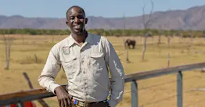 Nat Hab Expedition Leader and elephant, Zimbabwe. 