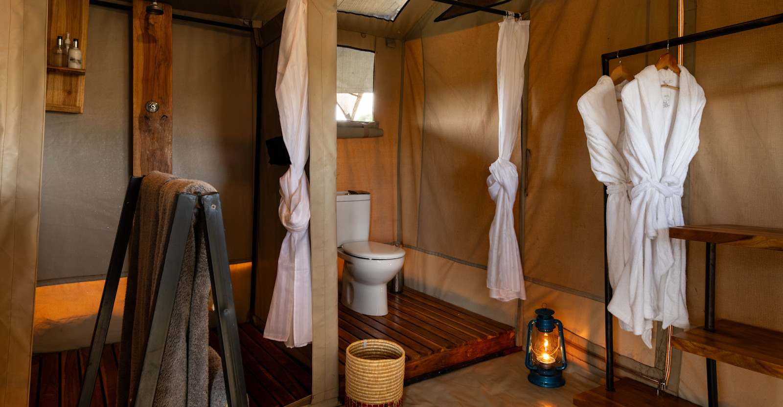 Guest tent bathroom at Nat Hab's Migration Camp—Serengeti