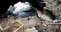 Nat Hab guests, Admirals Arch, Kangaroo Island, Australia.