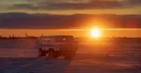 Tundra sunset with Polar Rover, Churchill, Manitoba.