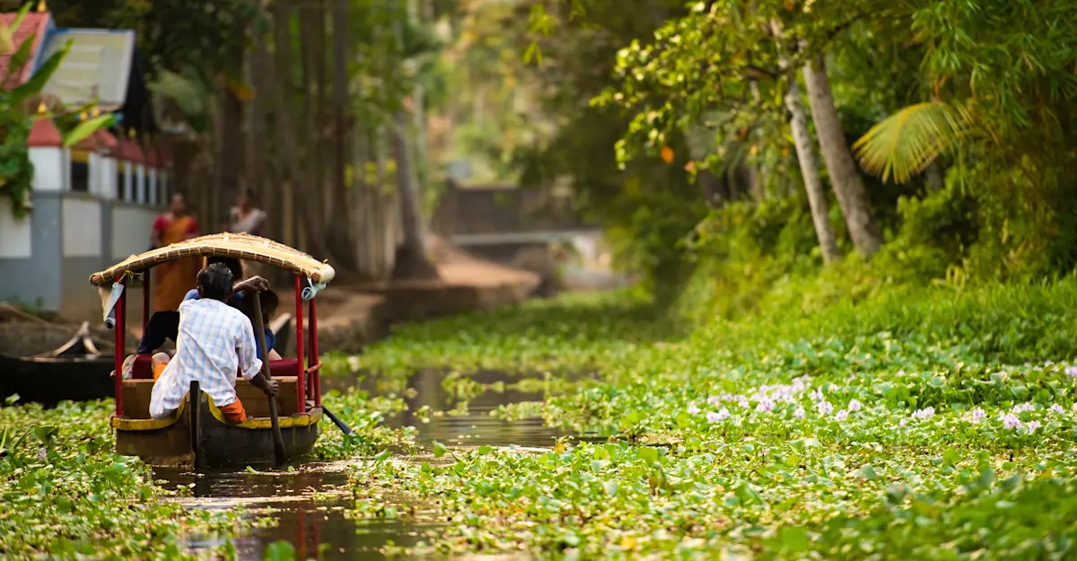 Traditional thatched-roof canoe, backwaters of Alleppey, Kerala, India.