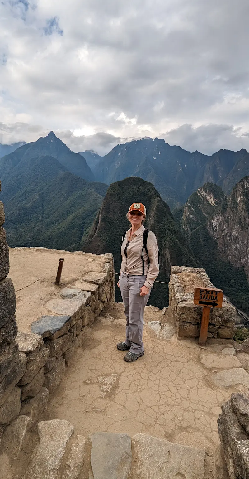 Marveling at the ancient structures of Machu Picchu in Peru. 
