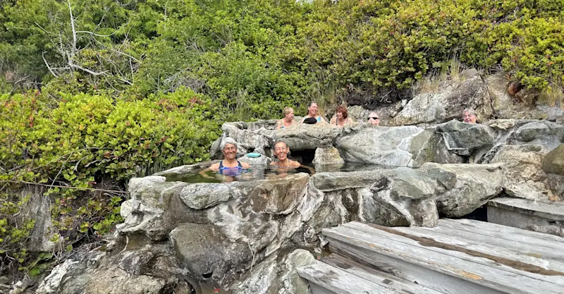 Nat Hab guests enjoy the natural hot spring at Hotspring Island, British Columbia.