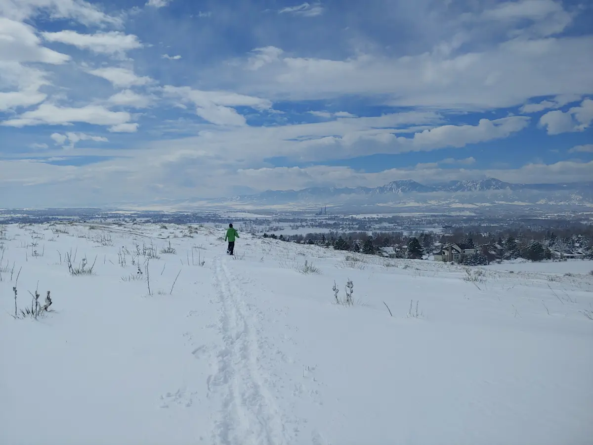 Trudging along through the snowy mountains of Boulder, Colorado.