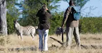 Nat Hab guest and local guide, Linyanti Reserve, Botswana.