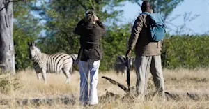 Nat Hab guest and local guide, Linyanti Reserve, Botswana.