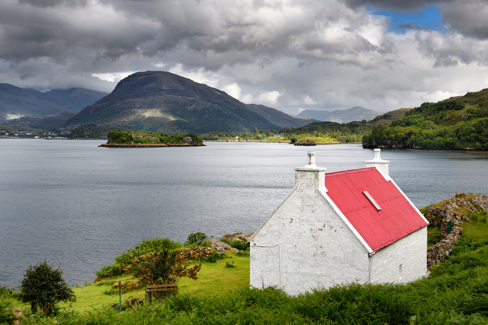 Red roofed cottage, Loch Shieldaig, Scotland.