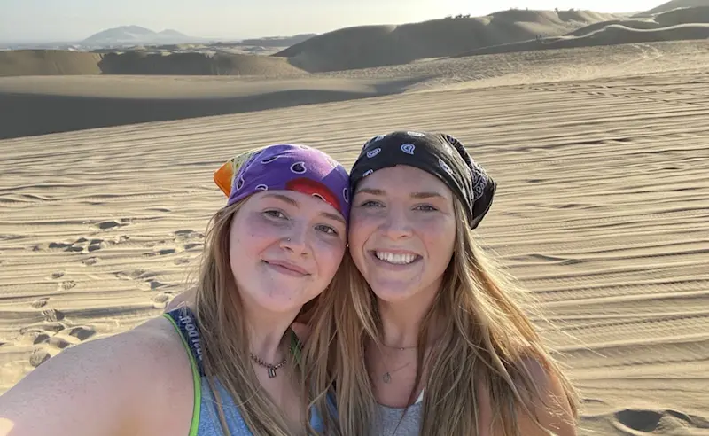 Wandering the golden dunes of the Huacachina Desert in Ica, Peru.