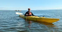 Kayaking at the mouth of the Churchill River on the Hudson Bay, Canada.