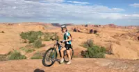 Mountain biking the famous Slick Rock Trail in Moab, Utah.