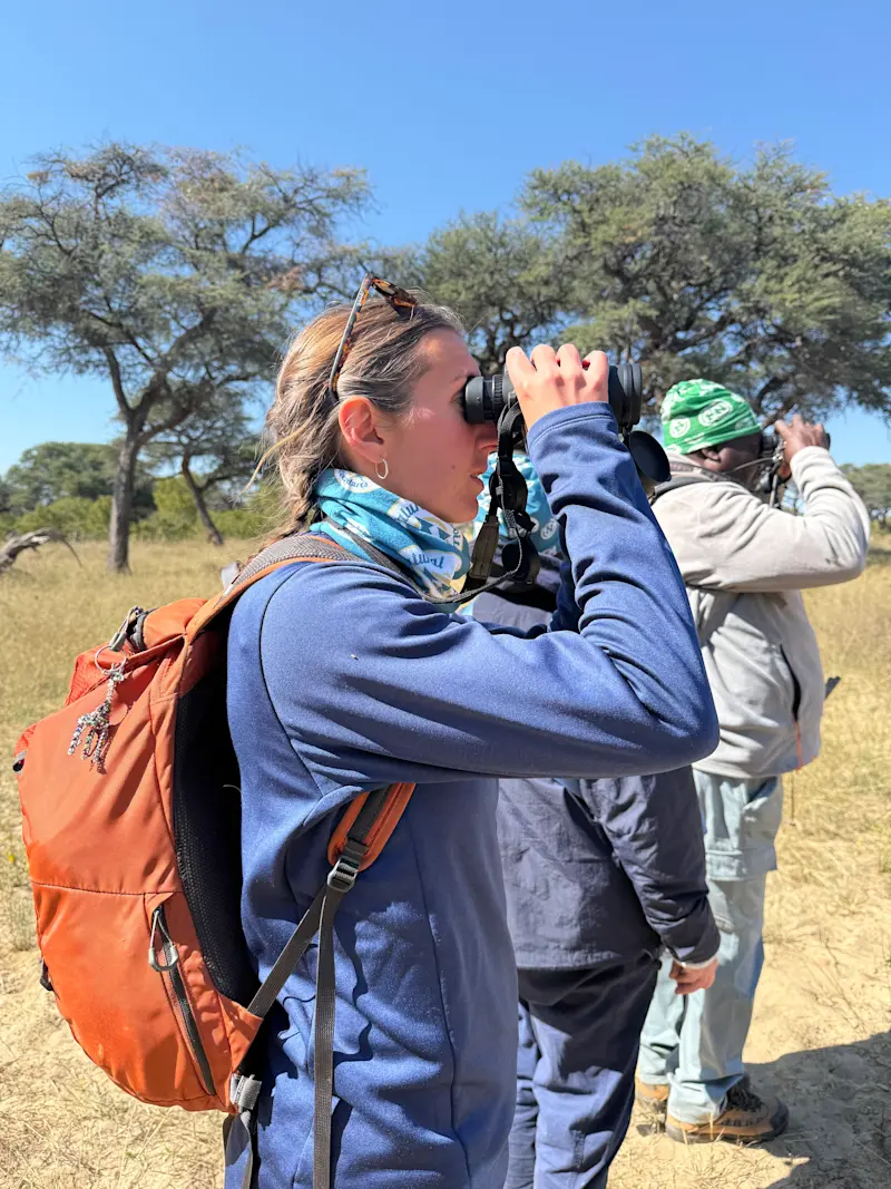 Viewing animals on a walking safari in Hwange National Park in Zimbabwe.