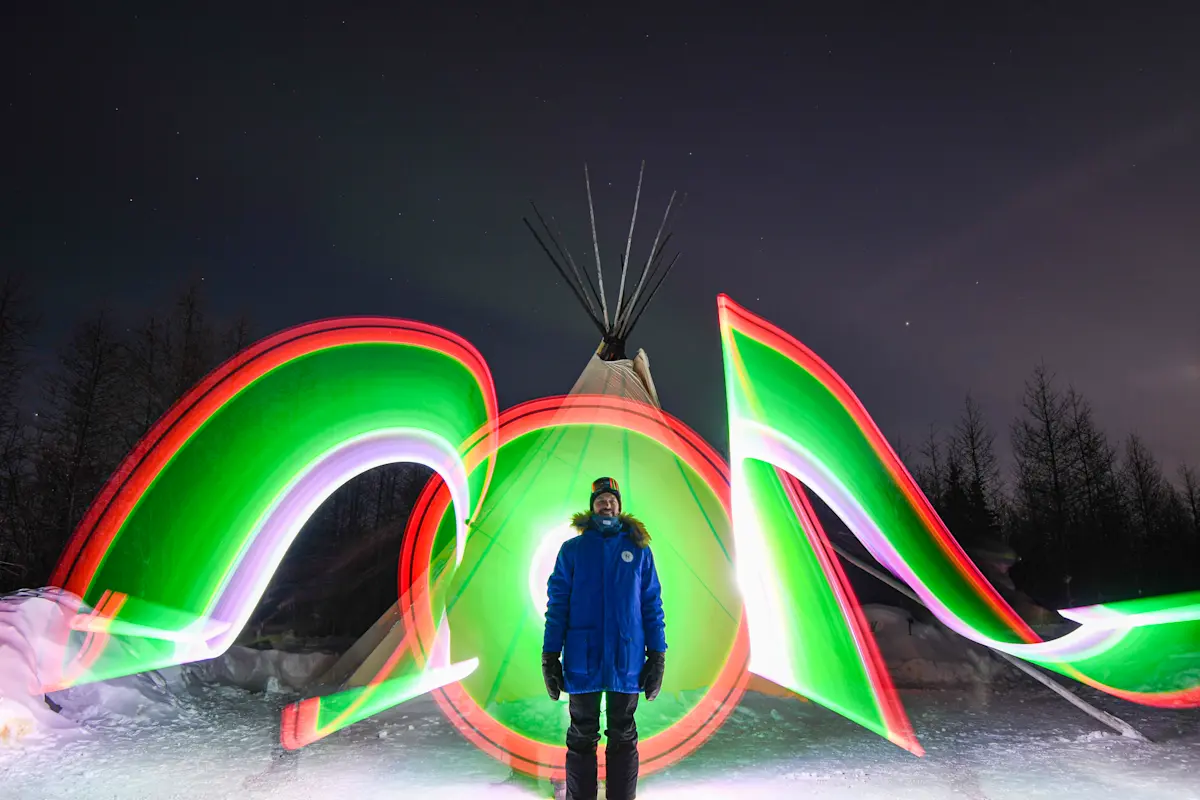 Creating light paintings under arctic skies at Wapusk Adventures in Churchill, Manitoba.