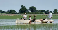 Nat Hab guests enjoy a bush lunch, Okavango Delta, Botswana.
