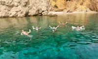 Nat Hab guests swimming in the Adriatic Sea, Croatia.