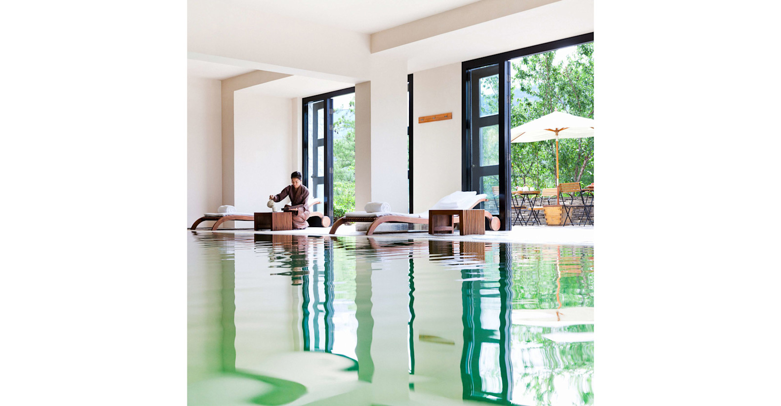 Indoor heated pool with outdoor sundeck