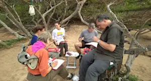 Bird banding Darwins Finches on the Galapagos with Earthwatch.