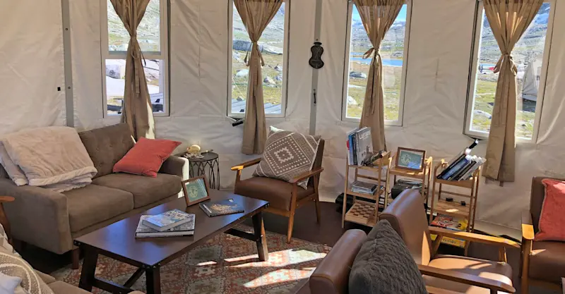 Sitting area inside tent at Nat Hab's Base Camp Greenland