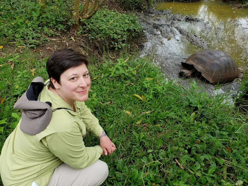 Hanging out with a giant tortoise in the Galapagos.