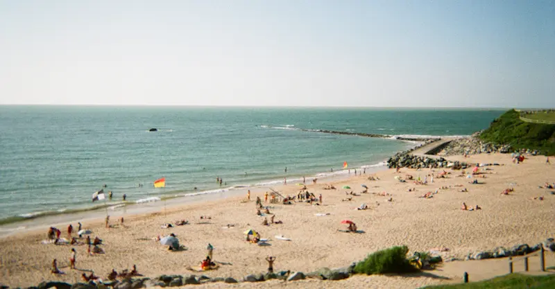 Capturing folks along the beach in Biarritz, France.