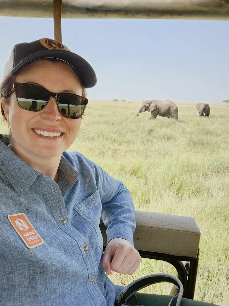 Listening to elephants munch on grass in Serengeti, Tanzania. 