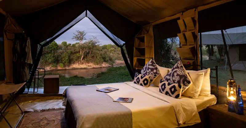 Guest tent at Nat Hab's Migration Camp—Maasai Mara National Reserve, Kenya.