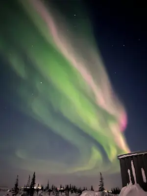 Marveling at the northern lights in Churchill, Canada.