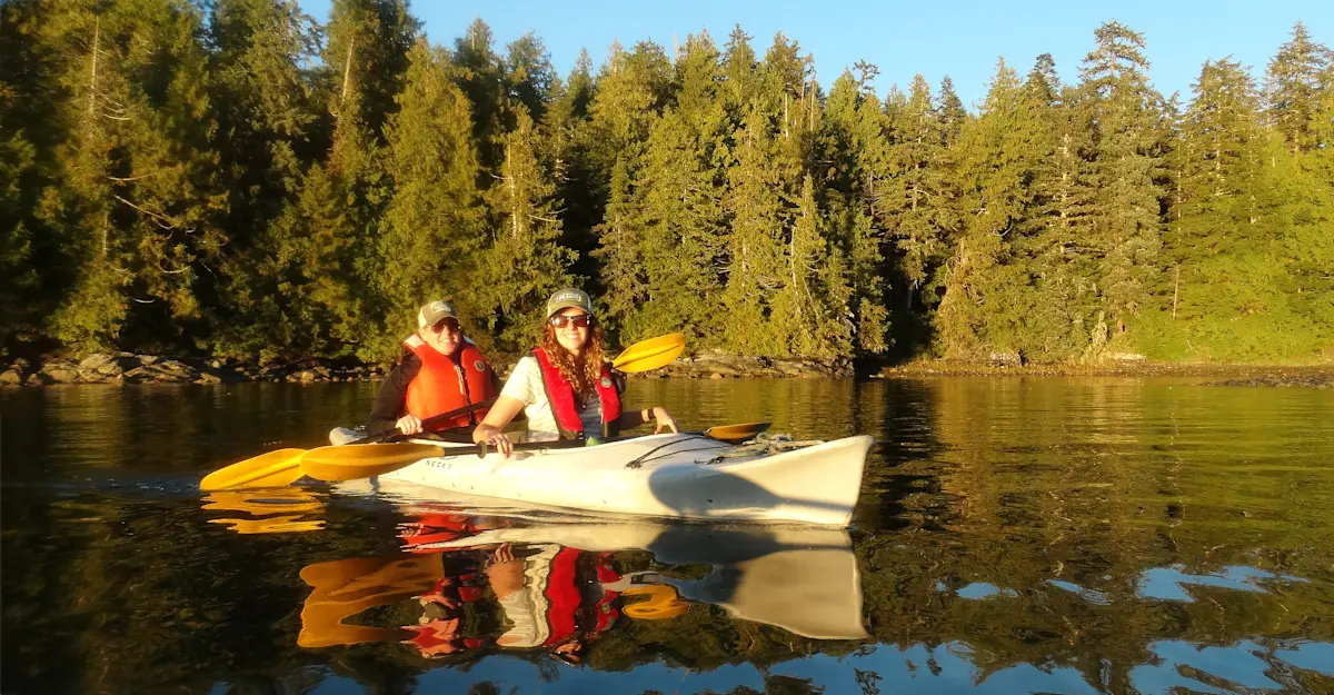 Nat Hab guests kayaking, Tuwartz Inlet, British Columbia.