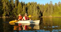 Nat Hab guests kayaking, Tuwartz Inlet, British Columbia.